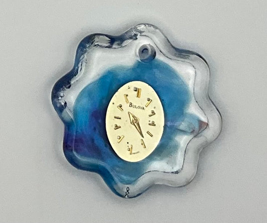Watch Dial and Blue Swirls